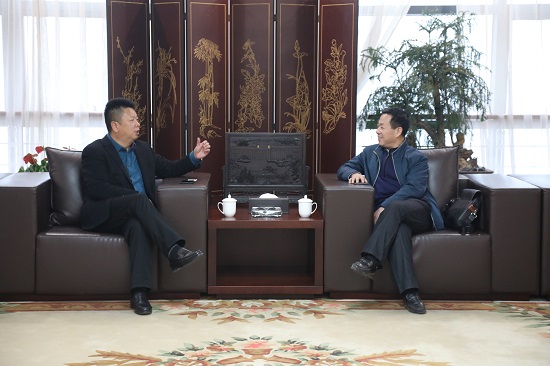 山东省土地储备开发集团董事王慎刚一行来集团调研交流